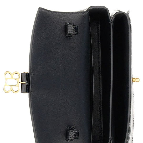 Close-up of Balenciaga crossbody hardware and fine stitching