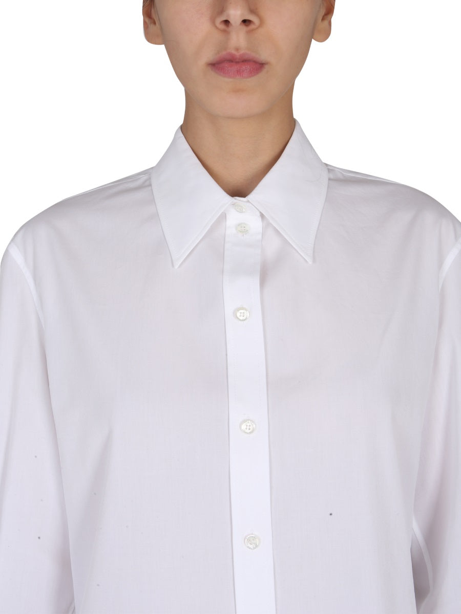Close-up of Alexander McQueen tee shirts hardware and fine stitching