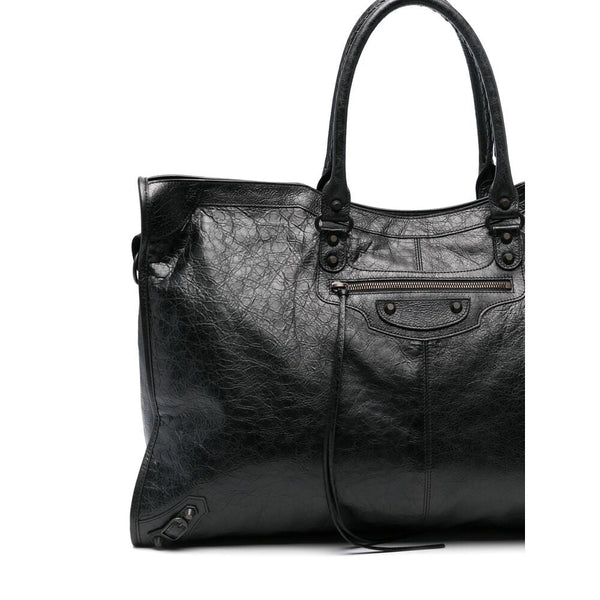 Close-up of Balenciaga weekend/travel bags hardware and fine stitching