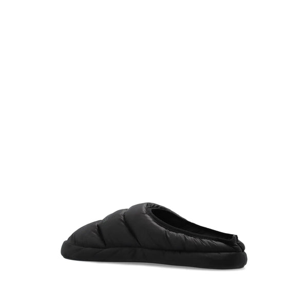 Close-up of Balenciaga sandals hardware and fine stitching