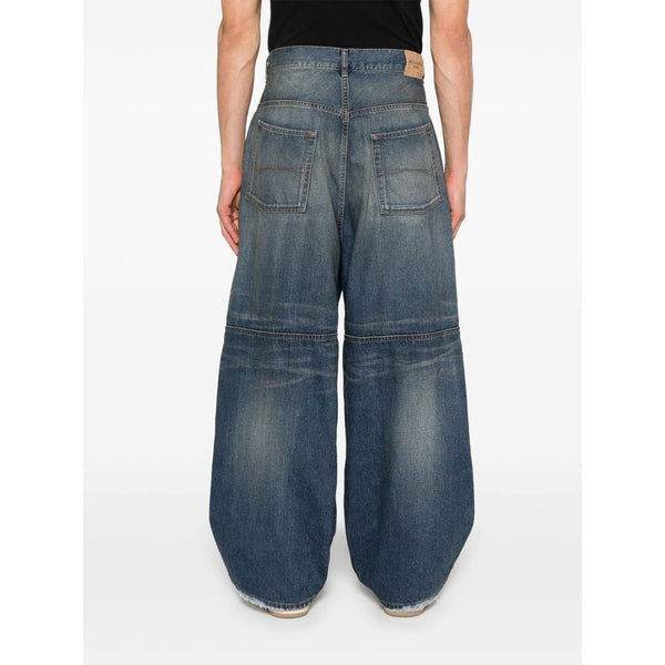 Close-up of Balenciaga pants hardware and fine stitching