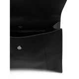 Close-up of Balenciaga totes hardware and fine stitching