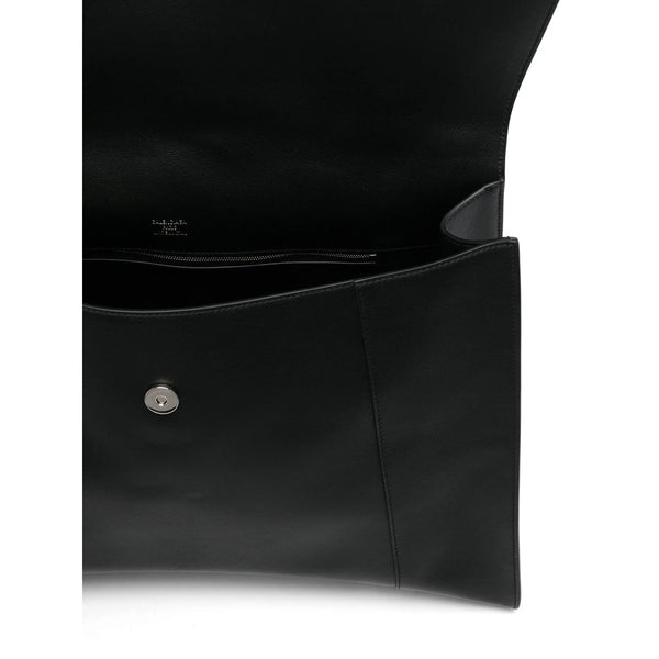Close-up of Balenciaga totes hardware and fine stitching