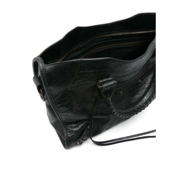 Close-up of Balenciaga totes hardware and fine stitching