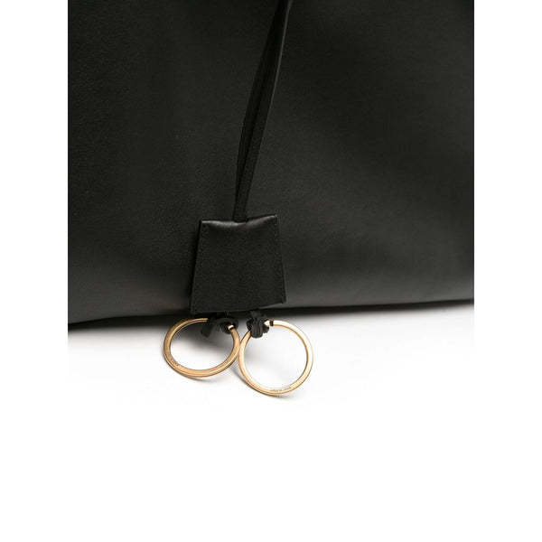 Close-up of Balenciaga cross body bags hardware and fine stitching