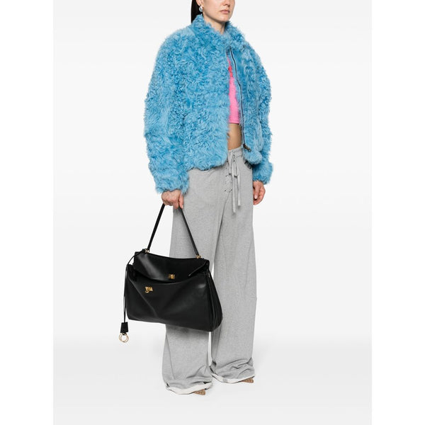 Balenciaga cross body bags lifestyle shot premium designer piece