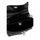 Close-up of Balenciaga totes hardware and fine stitching