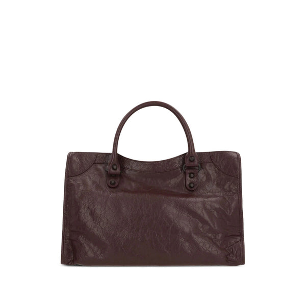 Close-up of Balenciaga totes hardware and fine stitching
