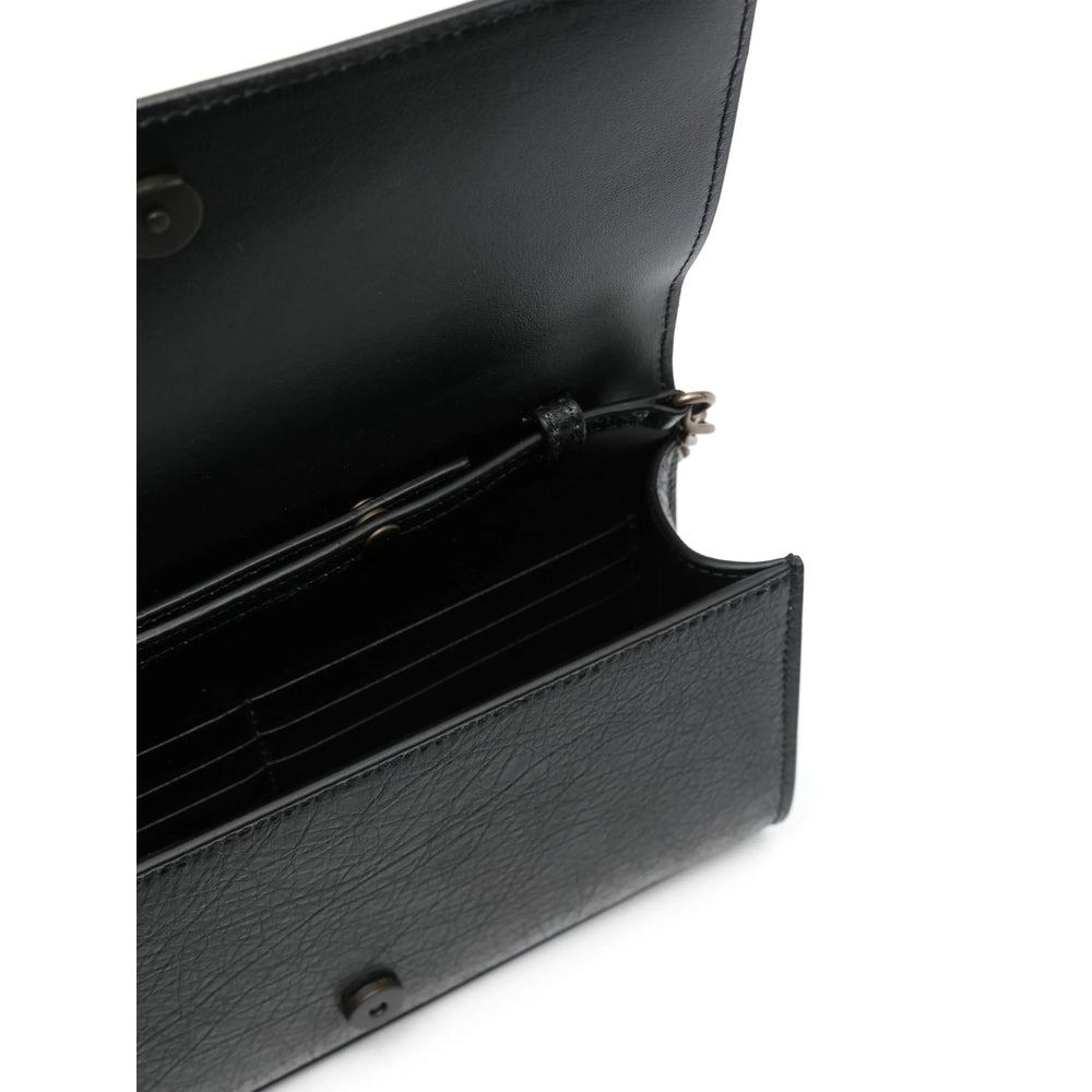 Balenciaga premium clutches detail and craftsmanship close-up