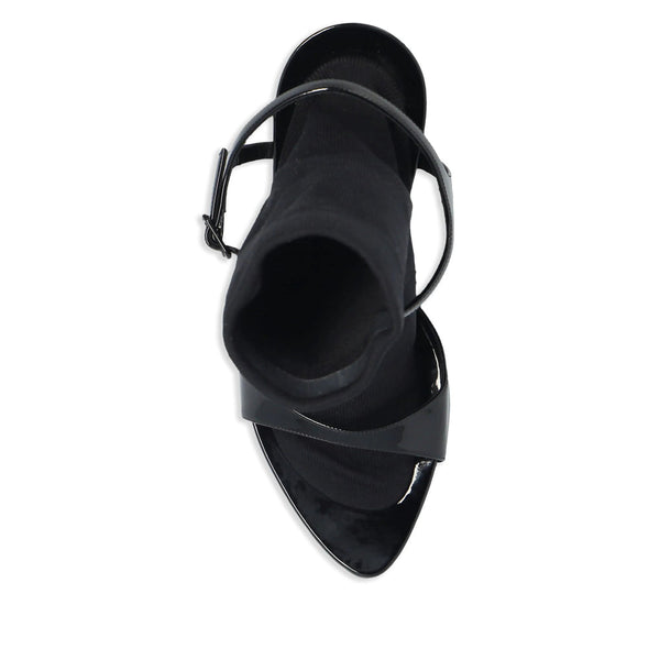 Close-up of Balenciaga sandals hardware and fine stitching
