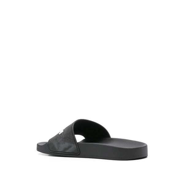 Close-up of Balenciaga sandals hardware and fine stitching