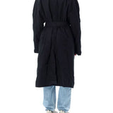Close-up of Balenciaga outerwear hardware and fine stitching