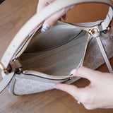 Side profile of Gucci Fashion Item showcasing structured silhouette