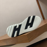 Hermes sandals Style 096 - logo and branding close-up