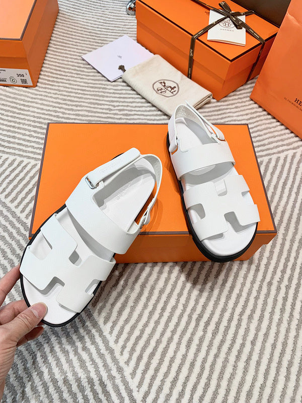 Hermès Black Crisscross Strap Sandals - Heel Detail View