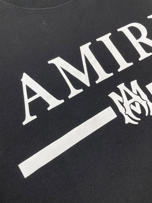 Three-quarter angle view of Amiri luxury piece style No.068