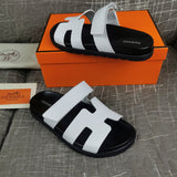 Hermès Black Slide Sandals - Lifestyle Styling Shot