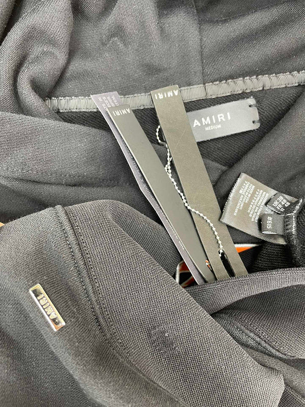 Three-quarter angle view of Amiri luxury piece style No.047