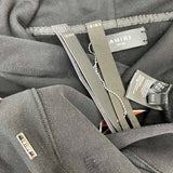 Three-quarter angle view of Amiri luxury piece style No.047