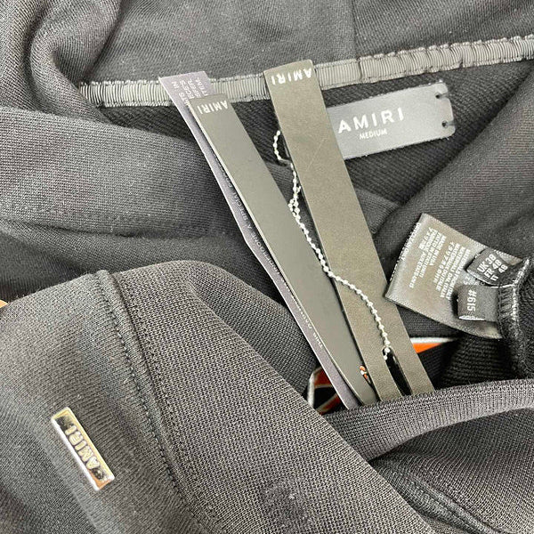 Three-quarter angle view of Amiri luxury piece style No.047