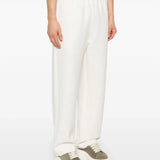 Close-up of Fendi pants hardware and fine stitching
