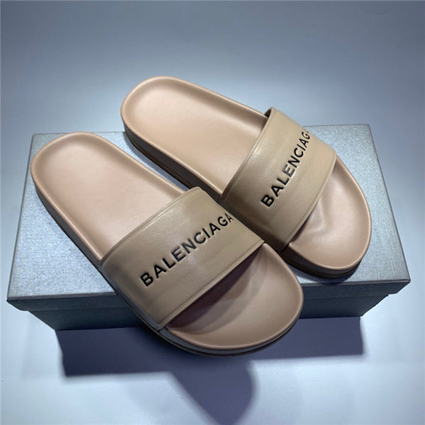 Balenciaga White Flat Thong Sandals - Angled View