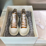 Alexander McQueen White Slip-On Sneakers - Detail Shot of Craftsmanship
