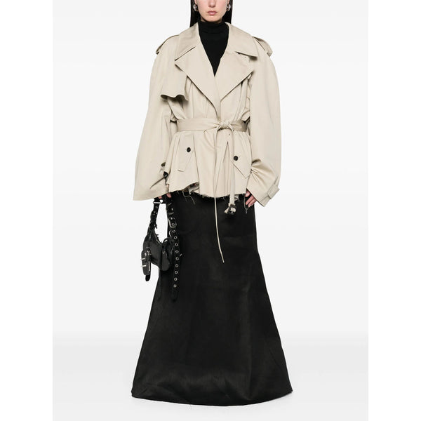 Close-up of Balenciaga coats hardware and fine stitching