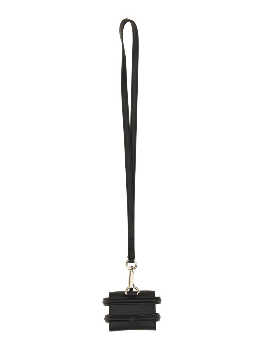 Alexander McQueen premium tech accessories detail and craftsmanship close-up