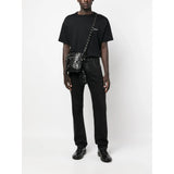 Close-up of Balenciaga cross body bags hardware and fine stitching