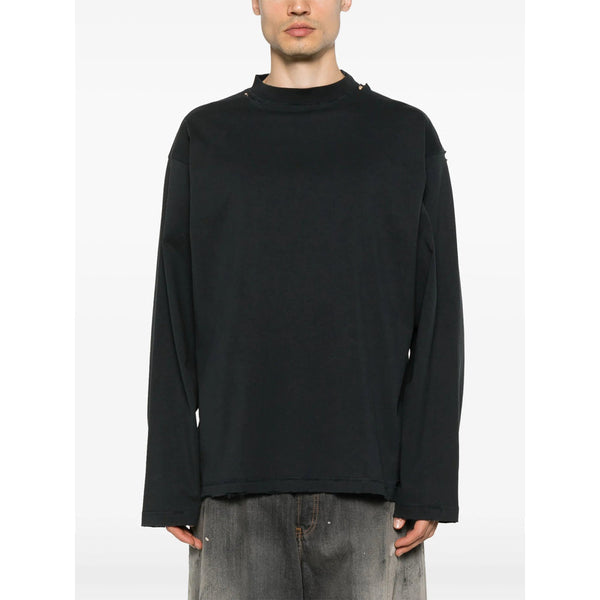 Close-up of Balenciaga tee shirts hardware and fine stitching