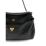Close-up of Balenciaga totes hardware and fine stitching