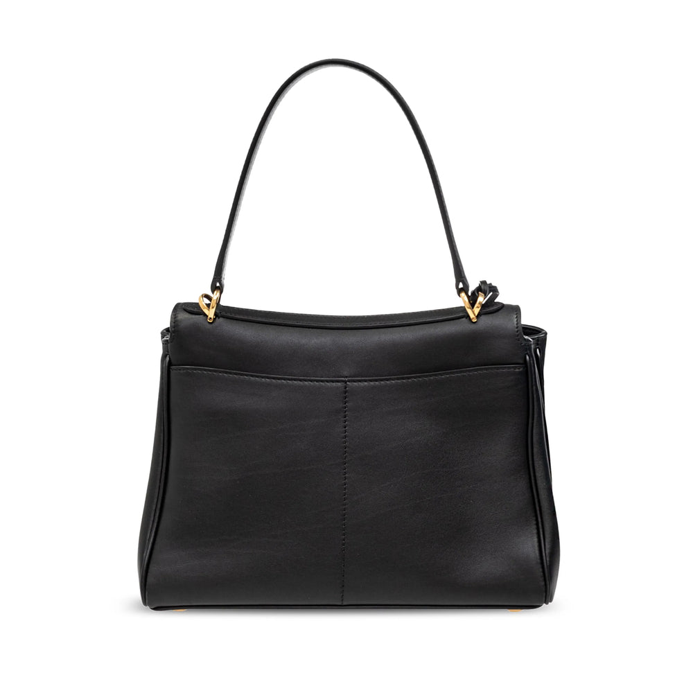 Close-up of Balenciaga totes hardware and fine stitching