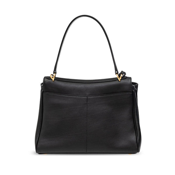 Close-up of Balenciaga totes hardware and fine stitching