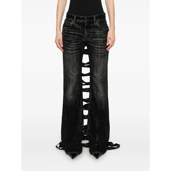 Close-up of Balenciaga pants hardware and fine stitching