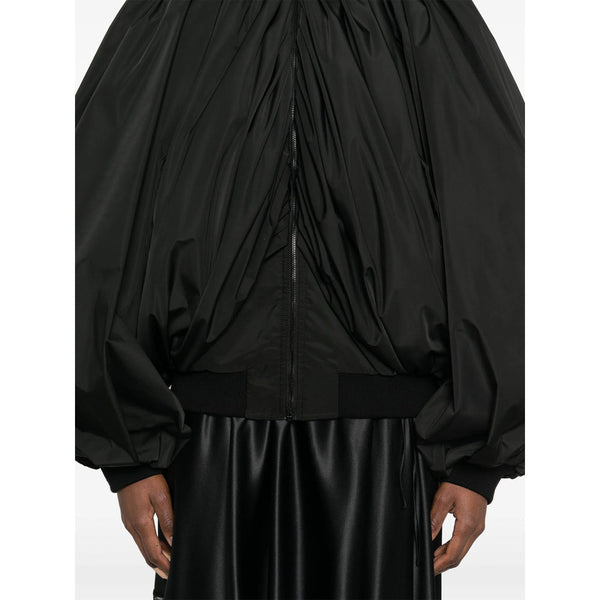 Close-up of Balenciaga jackets hardware and fine stitching