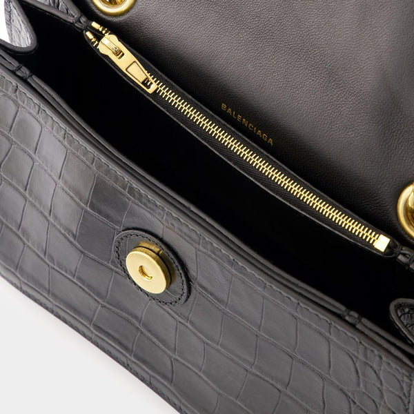 Close-up of Balenciaga shoulder bags hardware and fine stitching