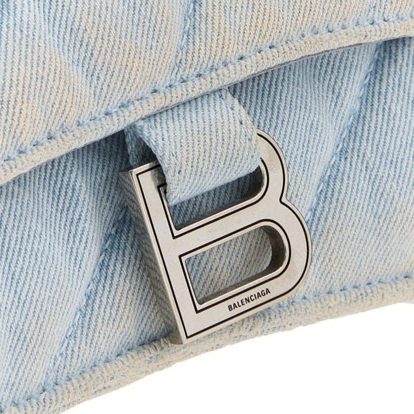 Close-up of Balenciaga crossbody hardware and fine stitching