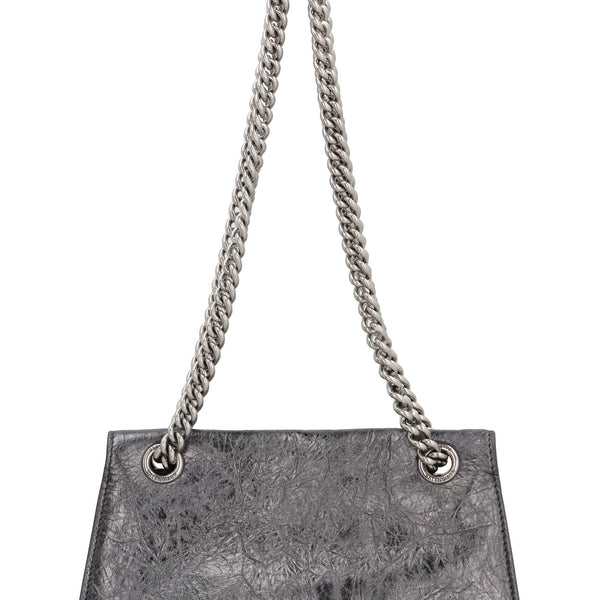 Close-up of Balenciaga shoulder bags hardware and fine stitching