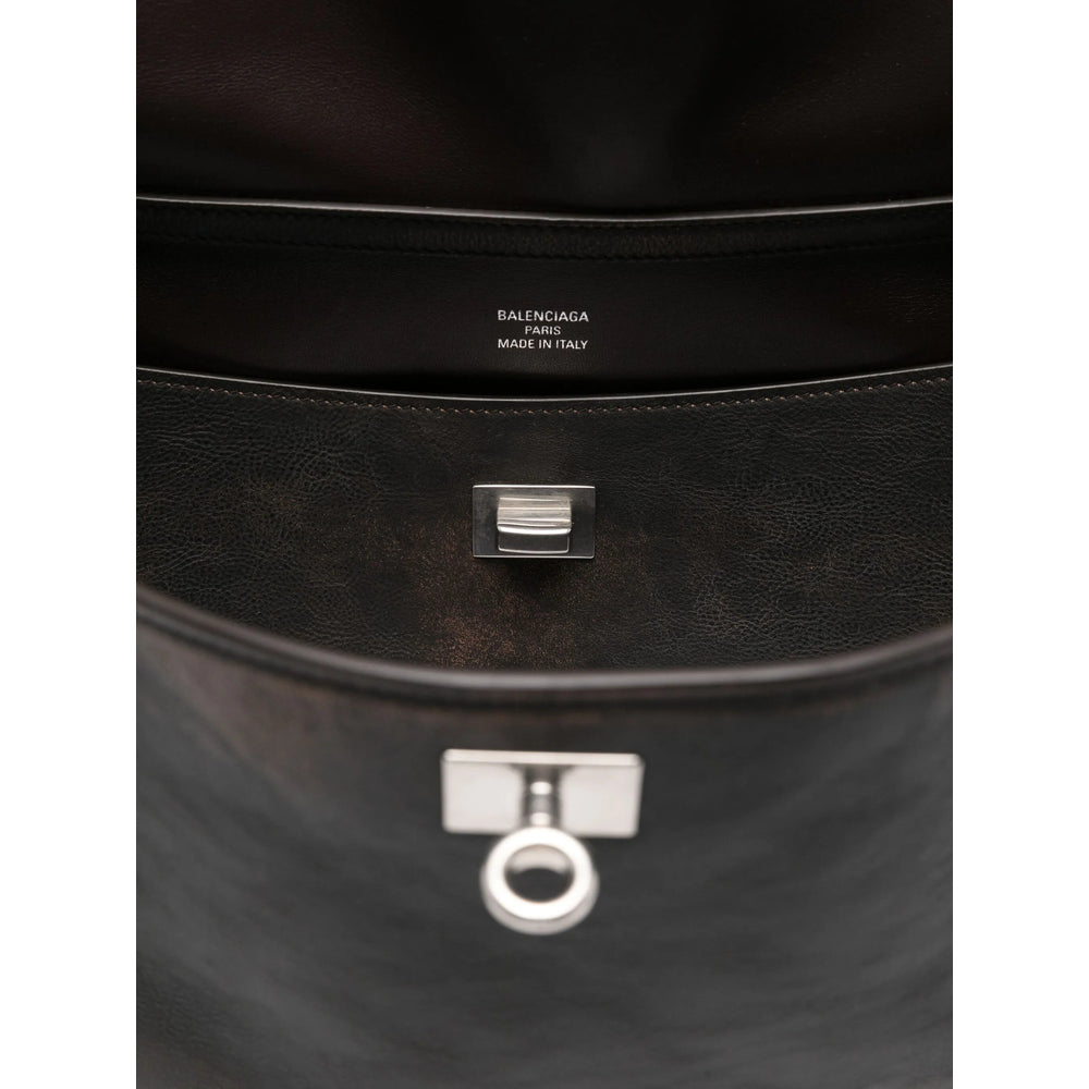 Close-up of Balenciaga totes hardware and fine stitching