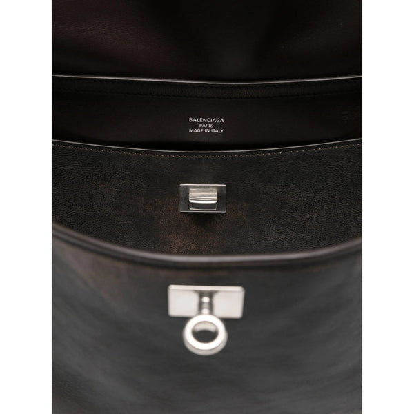Close-up of Balenciaga totes hardware and fine stitching