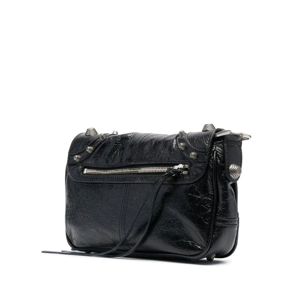 Close-up of Balenciaga cross body bags hardware and fine stitching