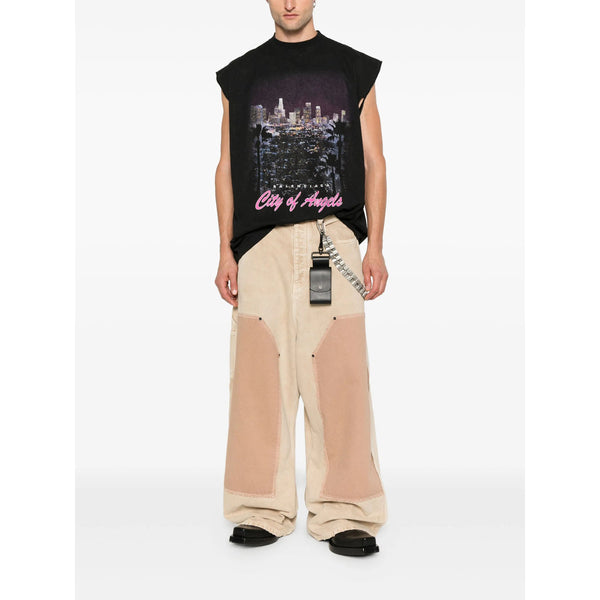 Close-up of Balenciaga pants hardware and fine stitching