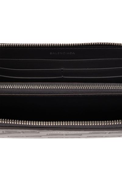 Close-up of Balenciaga small leather goods hardware and fine stitching