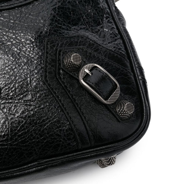 Close-up of Balenciaga handbags hardware and fine stitching