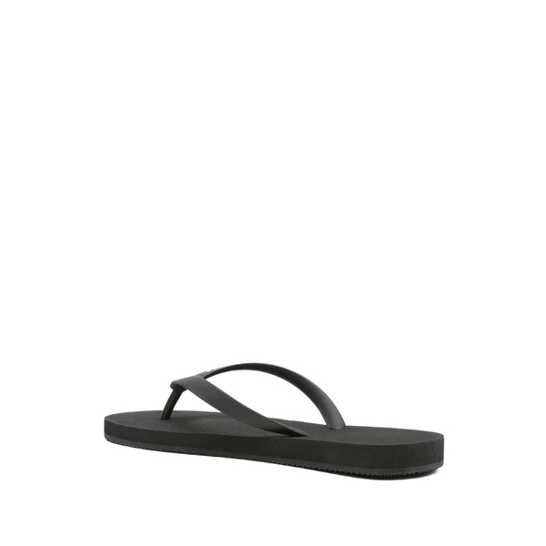 Close-up of Balenciaga sandals hardware and fine stitching