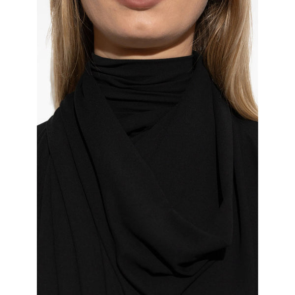 Close-up of Balenciaga cocktail dresses hardware and fine stitching