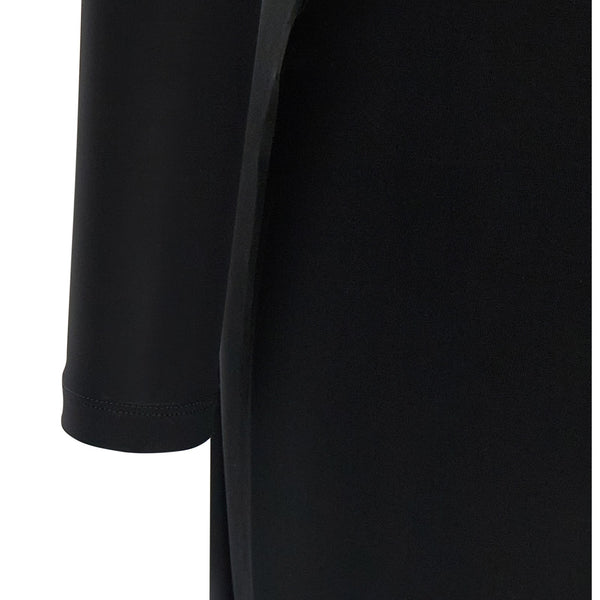 Close-up of Balenciaga rompers & jumpsuits hardware and fine stitching