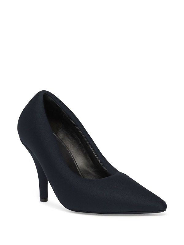 Close-up of Balenciaga pumps hardware and fine stitching