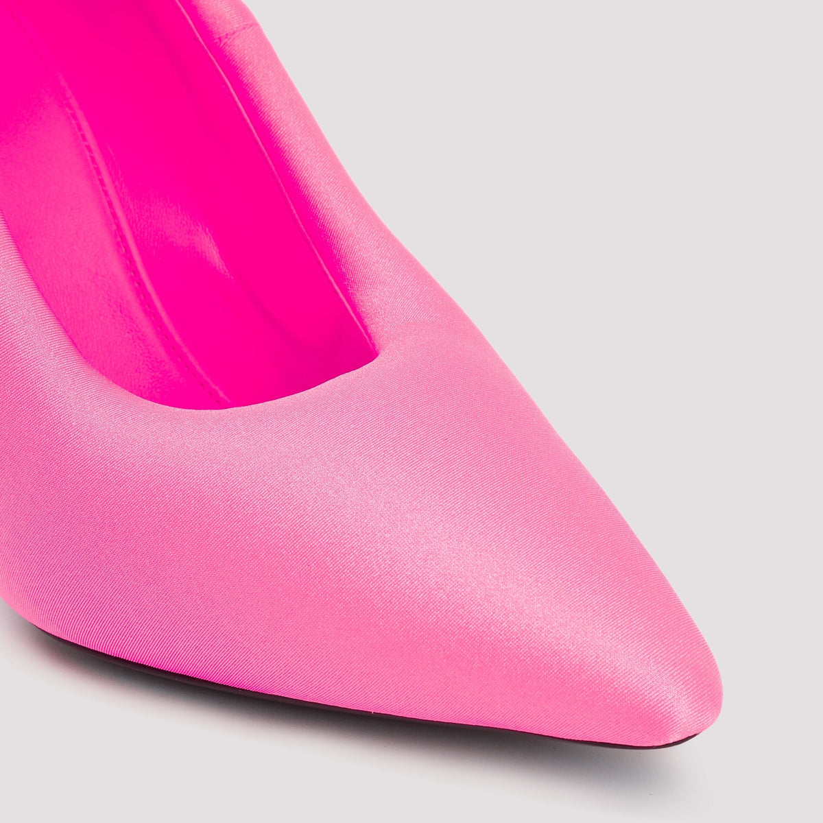 Close-up of Balenciaga pumps hardware and fine stitching